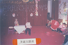Children performing on stage at school